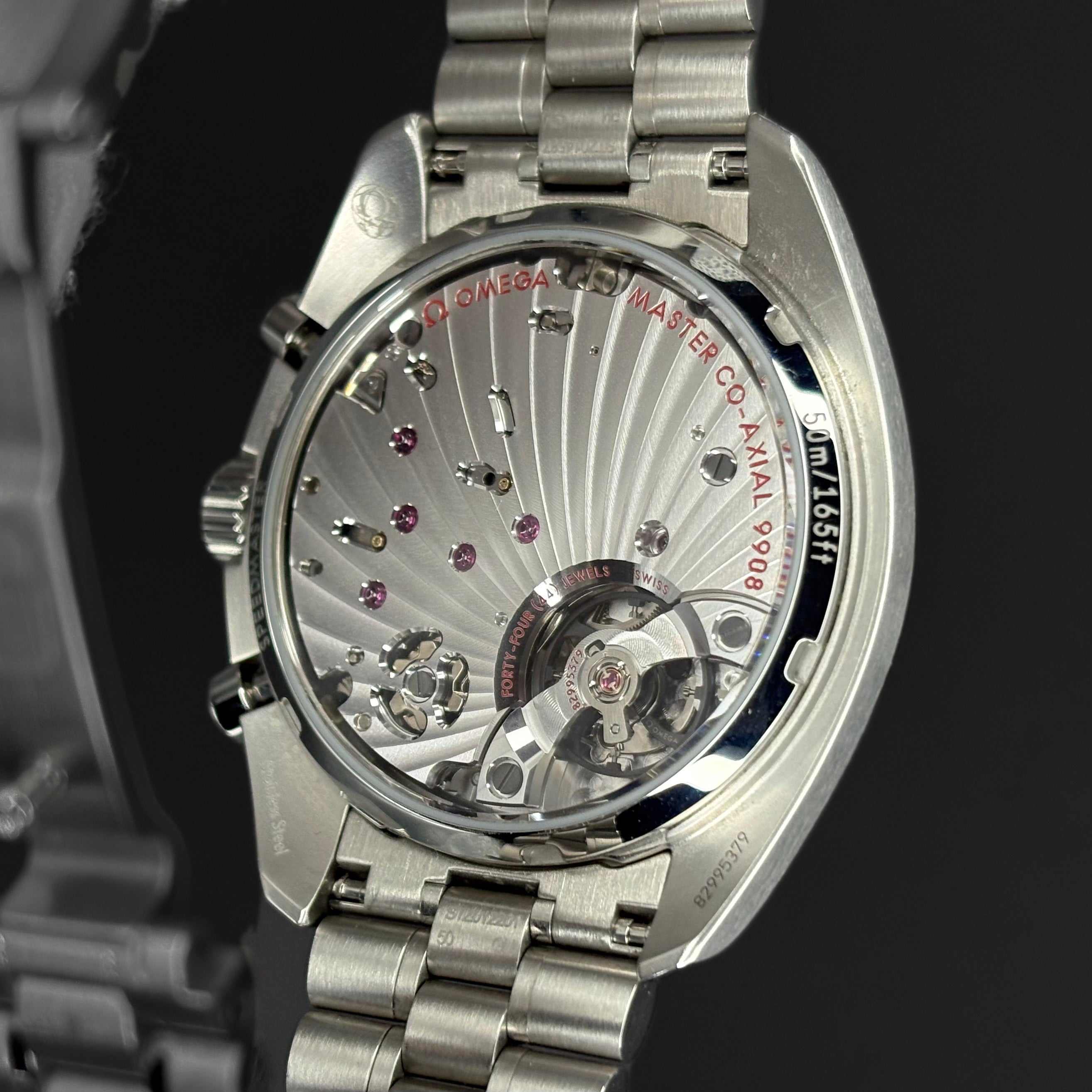 Omega Speedmaster Chronoscope Blue Dial 329.30.43.51.03.001 case back showing Caliber 9908 movement